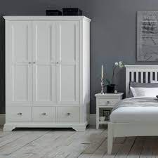 Supplement your closet space with stylish armoires and wardrobe closets that keep your clothing and other items neat and organized. The Carrington White Triple Wardrobe White Bedroom Furniture White Bedroom Furniture White Bedroom Bedroom Chairs Uk