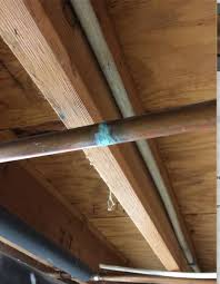 repair leaky copper pipe in basement