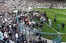 Although it didn't say that standing supporters were the cause, he recommended that all fans should have a place to sit. Hillsborough Disaster Wikipedia