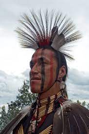 The mohican or mohawk hairstyle is one of the coolest hairstyles in which the hair on two sides of the head is shaven all the way up, leaving a strip of longer hair in the middle. Kahnawake Mohawk Indians Native American Men Native American News