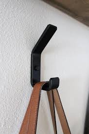 These practical and modern hooks are versatile and look good even when not in use. Double Metal Wall Hooks Modern Farmhouse Hook Waxed Black Etsy Metal Wall Hooks Wall Hooks Modern Wall Hooks