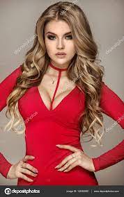 fashionable blonde in red dress