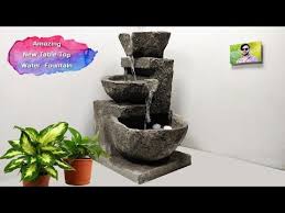 Here is a really cool way to create your own water feature at your home! Wow Amazing Home Made Cement Table Top Water Fountain Indoor Waterfalls Water Fountain Youtube Indoor Fountain Cement Table Water Fountain