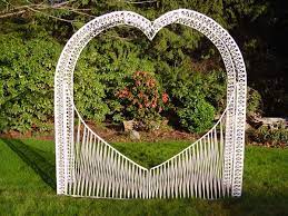 A White Wicker Wedding Arch At All