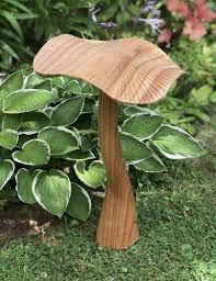 set of three wooden mushrooms for