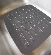 Sink mats are typically made from a softer material like silicone, while sink grids, a.k.a. Black Protective Sink Mats To Safeguard Your Dishes And Glasses Mdesign Set Of 2 Customisable Kitchen Sink Protectors Pvc Kitchen Sink Accessories Racks Holders Mfb Afg Cooking Dining