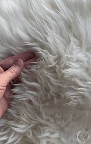 how to clean a sheepskin rug make it