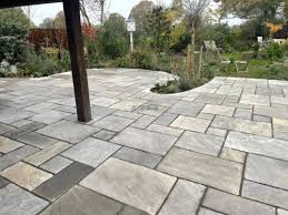 Indian Sandstone Patio With Brick Wall