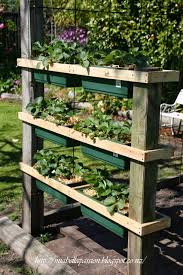 Diy strawberry wooden tower planter this is a nice narrow wooden tower by pass along plants. Diy Strawberry Or Herb Planter With Measurements Hometalk