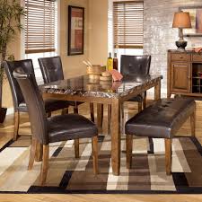 These dining room sets come in a variety of finished and sizes to suit any home, whether you are looking for a matching dining set is an easy way to achieve a coordinated look for every size and space. Signature Design By Ashley Lacey D328 25 4x01 00 6 Piece Dining Table With Side Chairs Bench Set Furniture And Appliancemart Table Chair Set With Bench