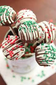Upside down pink gold cakepops with flat bottom base and stripes swirls design. 22 Christmas Cake Pops No One Will Be Able To Turn Down Christmas Cake Pop Recipe