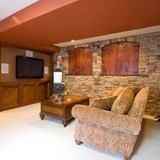 75 Rustic Basement With Red Walls Ideas