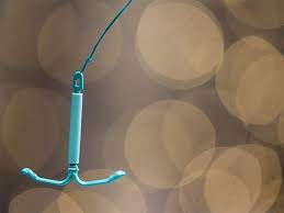 can an iud cause a heavy period
