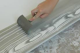 Faux finish painting is a technique that creates texture and nuance by replicating the look or feel of other surfaces, such as striped wallpaper, suede or dip a damp sea sponge into a glaze/paint mixture and lightly dab the mixture in a random pattern on your wall. Photo Zdsc 0458 Jpg Faux Wood Paint Faux Wood Wall Diy Painting