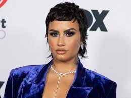 demi lovato s pitch black pixie cut and