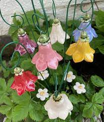 ceramic bellflowerplant stake fairy