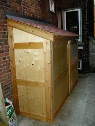 small storage shed with sliding door