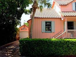 The soft nature of this pink is a perfect backdrop to match almost any color to. Jpdsodpb S Image Dolpsins Cove House Exterior Blue Beach House Exterior Craftsman Home Exterior