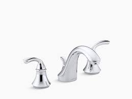 sink faucet with sculpted handles