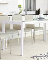 The table's four straight leg support brings a simple style to any space, making it. Oval Extending White Dining Table Seats Up To 10 People Danetti