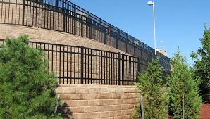 Fence Railing Above A Retaining Wall