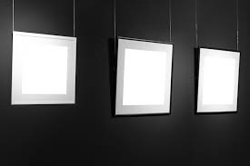 Three Empty Frames On Black Wall Blank