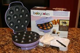 Using oven gloves take the mould out of the oven, and allow the cake balls to completely cool, gently remove the top mould releasing the cake balls. Easy To Make Your Own Cake Pops With The Babycakes Cake Pop Maker
