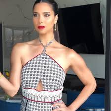 roselyn sanchez s powerful red lip with