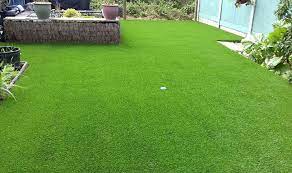 concrete patio with artificial grass