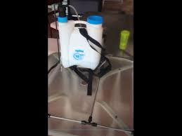dual nozzle boom for backpack sprayer