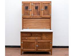 vine hoosier kitchen cabinet with a