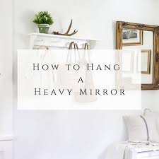 How To Hang A Heavy Mirror She Holds
