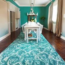 what color paint goes with teal carpet