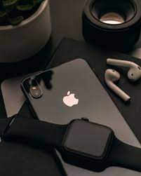 Apple Watch over black iPhone X photo ...