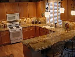We have a lot of granite countertop ideas here! Yellow River Granite Kitchen Countertop From Comparing Sandstone Countertops Pictures