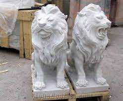 white marble lion sculpture garden