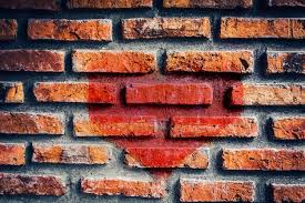 Heart On The Old Broken Brick Wall