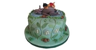 Evenly trim the sides of the cake until it measures 9×9″. Jungle Book Cake
