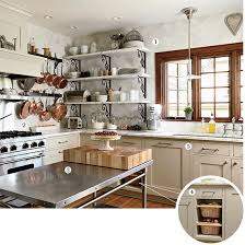 A large island with butcher's block countertop offers plenty of workspace and warmth against the kitchen cabinets. An Ultra Practical Bistro Style Kitchen Food Wine