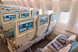 These seats slide down to become sloped beds, and don't give aisle. Emirates Economy Class Review What S Emirates Economy Like Sand In My Suitcase