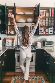 Group together things like packets of sauce mixes, gravy mixes, hot cereal packets and hot cocoa envelopes, then put them into small plastic containers to avoid them being scattered all over the cabinet. 3 Step Method For Organizing Your Kitchen Feeling Like A New Woman