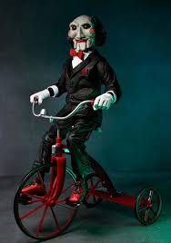 saw billy puppet on tricycle 12 inch