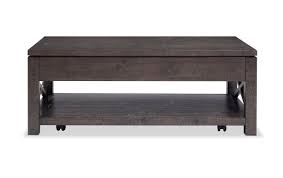 Other lift top coffee tables have adjustable lift tops that can also function as a higher table top for eating or using a laptop while in the couch. Extreme Lift Top Coffee Table Bob S Discount Furniture