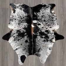 exotic chocolate tricolor cowhide rug
