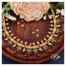 cute gold mango necklace from grt
