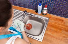 get rid of black k in sink drains
