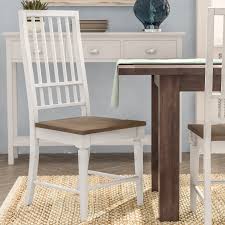 Crafted of hardwood solids, engineered wood, and veneers, the table features turned legs. Rosecliff Heights Pineville Solid Wood Slat Back Side Chair In Distressed White Reviews Wayfair