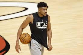 Bonus points for the discreet greek reference in his suit's jacket. What Giannis Antetokounmpo Said About Racism In America After Capitol Mob Violence