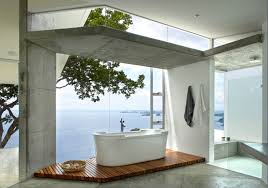 Glass Walls And View Of Sea In Bathroom