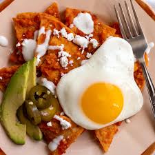 red chilaquiles with eggs
